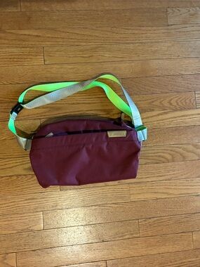 Bellroy Maroon Crossbody Sling Bag with Neon Accent Strap